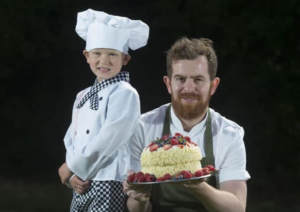 FOOD FUN: Simon Jewitt, head chef at Norse restaurant in Harrogate, with little chef Rufus Dale.