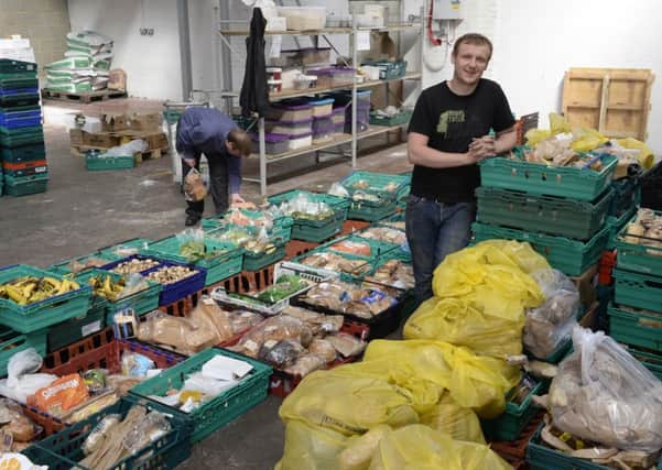 Adam Smith, founder of the Real Junk Food Project, at the food giveaway in Pudsey. Picture by Bruce Rollinson.