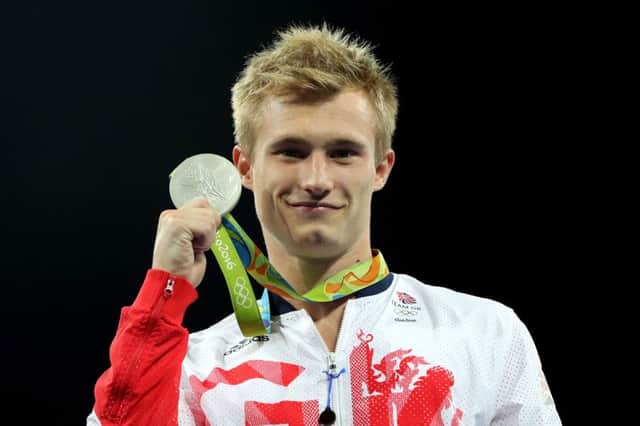 Great Britain's Jack Laugher has won a silver medal in the men's three metres springboard