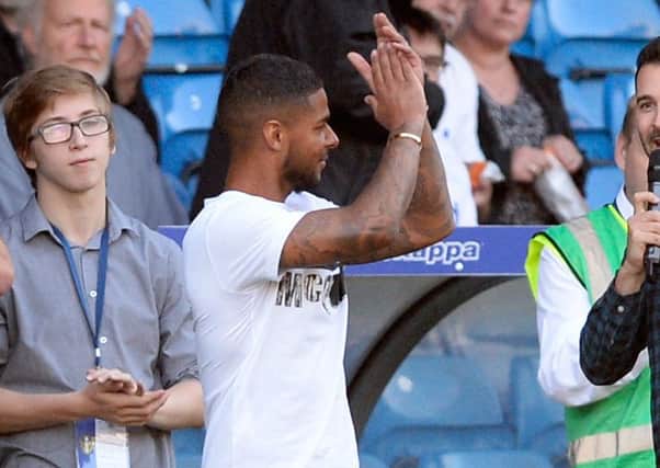 Liam Bridcutt applauds the Leeds fans before kick off against Fulham.