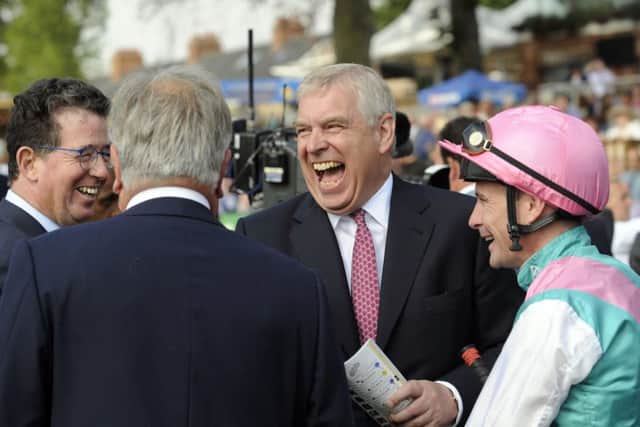 Prince Andrew shares a joke with jockey Pat Smullen during the first day of the Ebor Festival. Pictures by Simon Hulme.