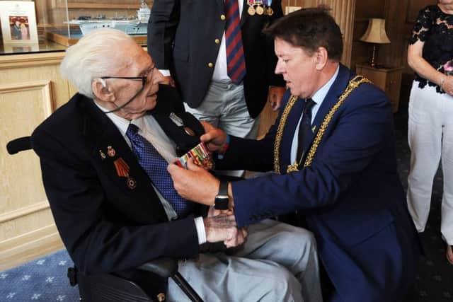 War veteran Fred Jackson is presented with his war medals, by the Lord Mayor of Leeds Gerry Harper, at the Leeds Civic Hall....18th August 2016 ..Picture by Simon Hulme
