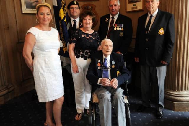 War veteran Fred Jackson is presented with his war medals, pictured with his family at the Leeds Civic Hall....18th August 2016 ..Picture by Simon Hulme