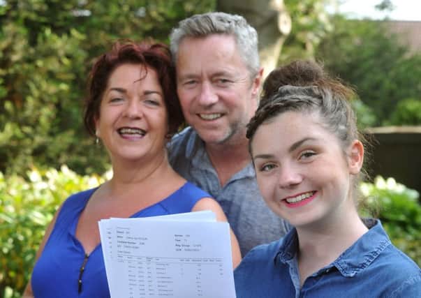 Joanna Wilson sister of Pudsey medal winning gymnast Nile Wilson returned home today from Rio to straight A*s needed to get to Cambridge, pictured with parents Sally and Neil. Picture Tony Johnson.
