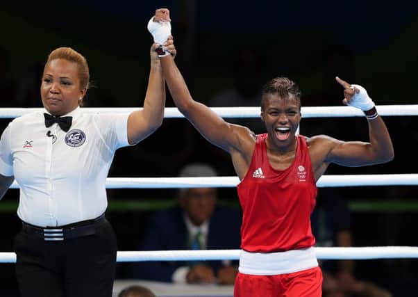 Leeds's own Nicola Adams celebrates victory following her flyweight semi final match against China's Ren Cancan. Photo: David Davies/PA Wire.