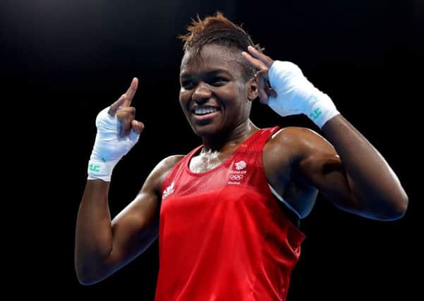 Leeds's own Nicola Adams celebrates victory over France's Sarah Ourahmoune to win gold. PIC: PA