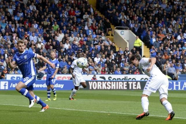 Marcus Antonsson heads in Leeds United's first goal.