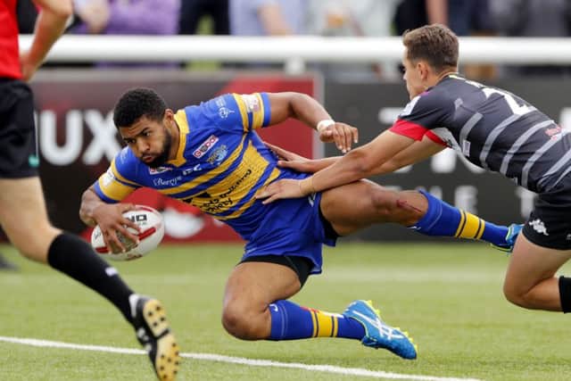 Leeds Rhinos' Kallum Watkins dives over for a try against London Broncos. Picture: Max Flego.