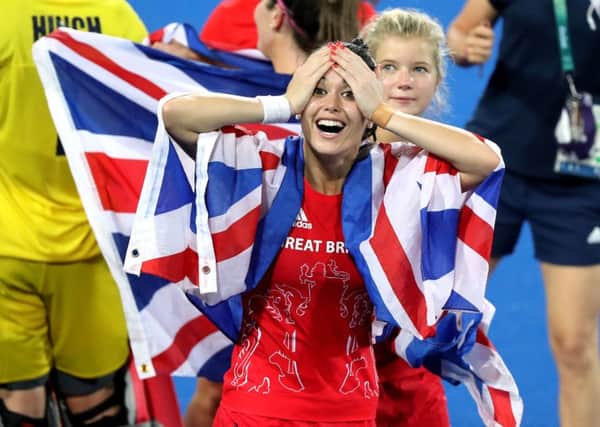 Great Britain's Sam Quek reacts after winning the gold-medal match at the Olympic Hockey Centre.