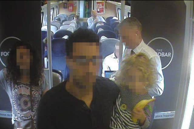Handout CCTV footage dated 11/08/16 issued by Virgin Trains which was filmed at 11.43 am, on a Virgin Train from King's Cross in central London, showing Labour Party leaderJeremy Corbyn (centre rear), seated in Coach H, shortly after being filmed while sat on the floor and more than two hours before his final destination, Newcastle, after a video emerged last week which showed Mr Corbyn sitting on the floor, reading a newspaper, and saying "This is a problem that many passengers face every day" before calling for public ownership of the railways. Picture: Virgin Trains/PA Wire