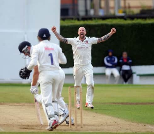 Cleckheaton v Hanging Heaton Braddford league sat 20th aug 2016
Cleckheaton bowler Sam Wilson celebrates getting the wicket of Nick Connolly of Hanging Heaton