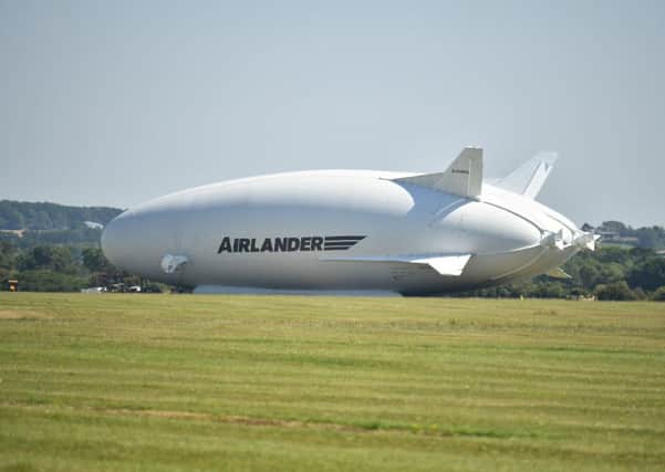 The Airlander 10, sits on the ground after crashing at Cardington airfield in Bedfordshire, following its second test flight, manufacturer Hybrid Air Vehicles said no-one was injured. 
Picture: Dominic Lipinski/PA Wire