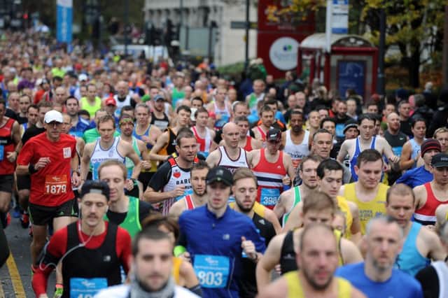 Date:15th November 2015. Picture James Hardisty.  Abbey Dash 2015, pictured Runners making their way along Wellington Street, Leeds.
