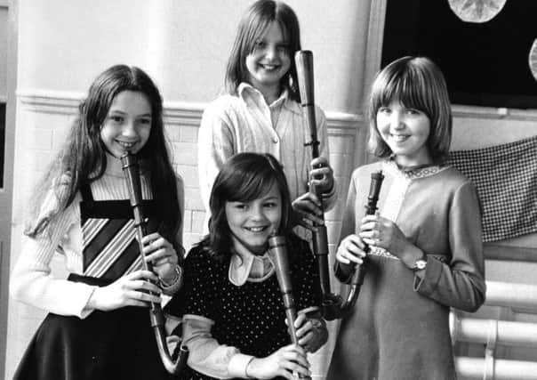 Harrogate.  26th April 1974

Home-made mediaeval musical instruments will be amongst those being played by a group of Harrogate children taking part in a Youth Week being staged at Harrogate Theatre nex month.

Pupils of the Western County Primary School, Harrogate, will be playing music of centuries ago in a concert on May 8.

They will play on old style instruments including several crumhorns - medieval wind instruments which look like inverted walking sticks made by music teacher Mr. John Whone.

Mr. Christopher Bostock, Director of Harrogate Theatre for Youth, who is organising the even, said: "It is intended that by giving young people the opportunity to use the theatre for their own enterprises they will be able to recognise the rolie it can play in society."

Picture shows Crumhorn players who will be taking part in Harrogate Youth Theatre Week which starts on Saturday.  From (left to right) they are:  Julie Newport (11), Linda Cawthorne (10), Michelle Fisher (10) and at the rear Susan Gill (10).