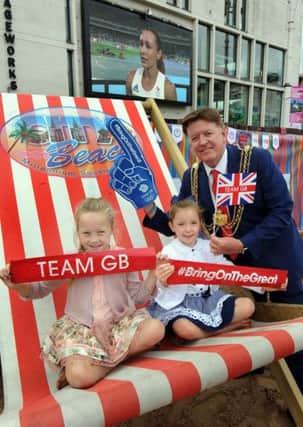 City Beach Millennium Square, Leeds  aug 2016
The Lord Mayor of Leeds Coun Gerry Harper with Zophia Tursy, eight and Phoebe Eddy, seven