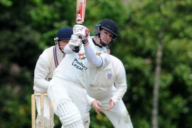 IN FORM: Pudsey St Lawrence opener Adam Waite hit an unbeaten century in the rain-hit game against Cleckheaton. Picture: Steve Riding