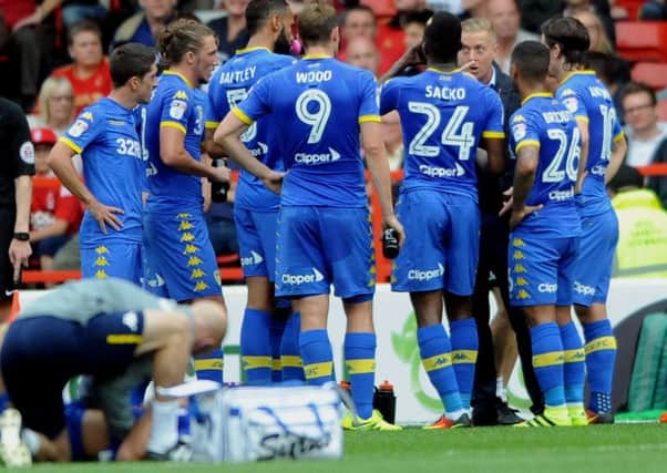 Garry Monk takes an opportunity to reinforce his message to the Leeds United players at the City Ground. PIC: Simon Hulme