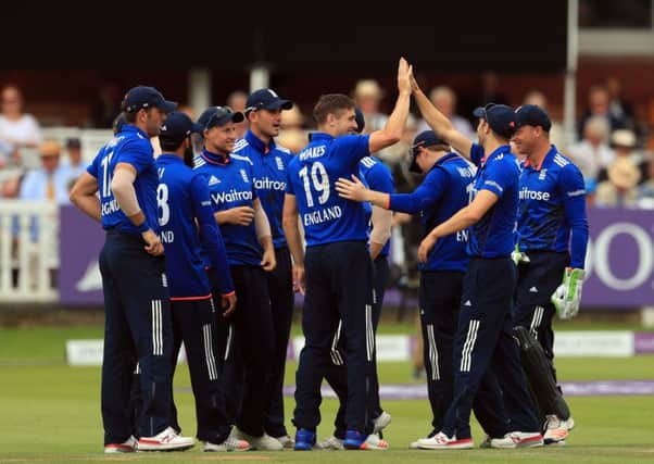 England's Chris Woakes (centre) celebrates the wicket of Pakistan's Azhar Ali during the Royal London One Day International Series match at Lord's, London. Photo credit  Adam Davy/PA Wire.