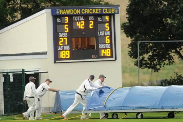 The covers came on for the abandoned Aire-Wharfe clash between Rawdon and North Leeds - a familiar sight last Saturday. PIC: Steve Riding