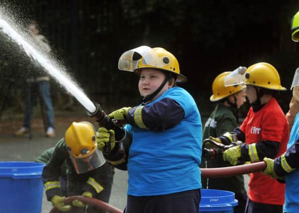 Young people from Leeds and Castleford take part in the Mini Fire Fit Olympics. Picture: Tony Johnson.