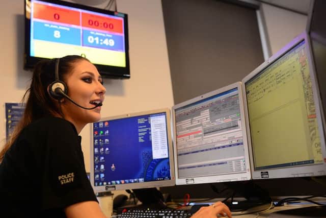 A member of the team in the contact centre at work.