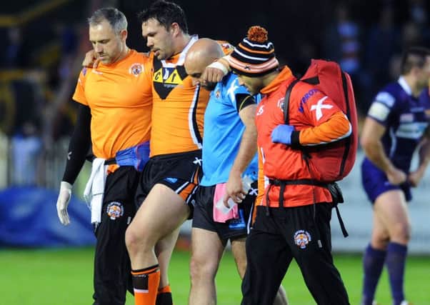 Castleford Tigers v Huddersfield Giants.
Castleford's Frankie Mariano is helped off the field with an injury.
21st May 2015.
Picture Jonathan Gawthorpe.