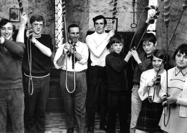 Leeds.  14th July 1970

Pictured is the new bell-ringing team at Armley Christ Church, Leeds.  Left to right: Nigel Thornton, Philip Barehead, Edward Lofthouse, Richard Thornton, Michael Tiffany, Stuart Armitage, Denise Rodgers and Sharon Preston.

They are still under instruction from Mr. and Mrs. R. Worford, bell-ringers at St. Matthew's Church, Chapel Allerton.

"We only recently started ringing the bells on a Sunday," said Mr. Nigel Thornton, an engineering student, of Armley Grange Drive.  "We have to keep muffles on yet, but hope that in a few weeks we may be experienced enought to ring without them."