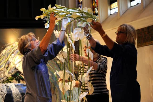 Leeds Minster celebrates 175 years with contemporary Floral designs.. Margaret Titman (left) and Catherine Gledhill put the finishing touches to a  Floral Design in the Minster...1st September 2016 ..Picture by Simon Hulme