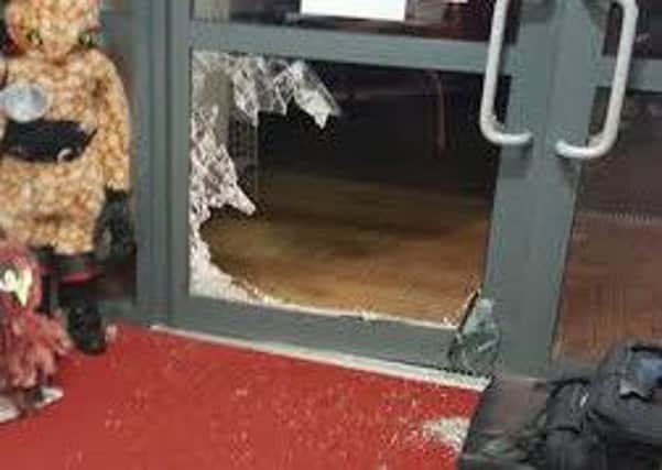 The damaged door at the cat centre