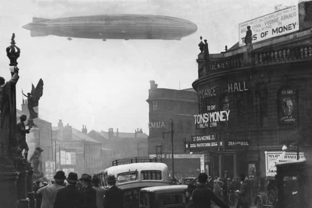 The YEP captures the moment the Graf Zeppelin passes over City Square in August 1931.

Was the great airship on a spying mission?