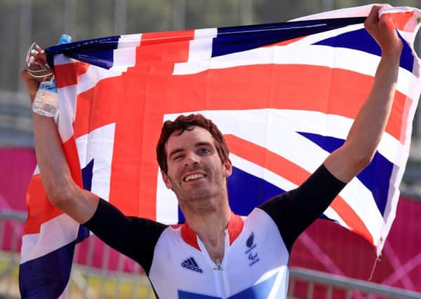 WINNER: Cyclist David Stone, of Leeds, celebrates after winning gold at the London Paralympics.