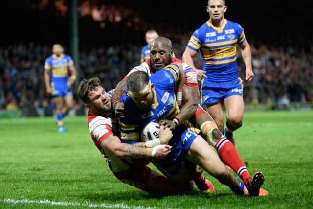 Substitute Adam Cuthbertson goes over for Leeds Rhinos' sixth try against Salford Red Devils. Picture: Bruce Rollinson