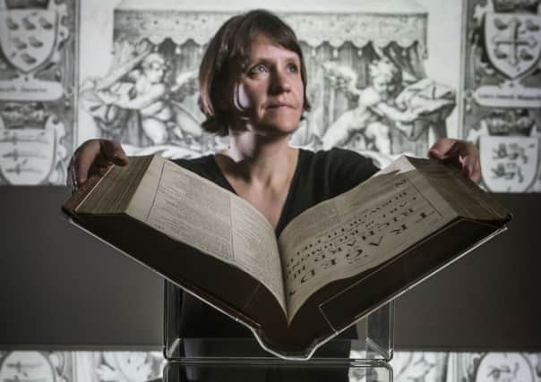 Leeds University's Rhiannon Lawrence-Francis with William Shakespeare's Comedies, Histories, and Tragedies, (the Fourth Folio), 1685.