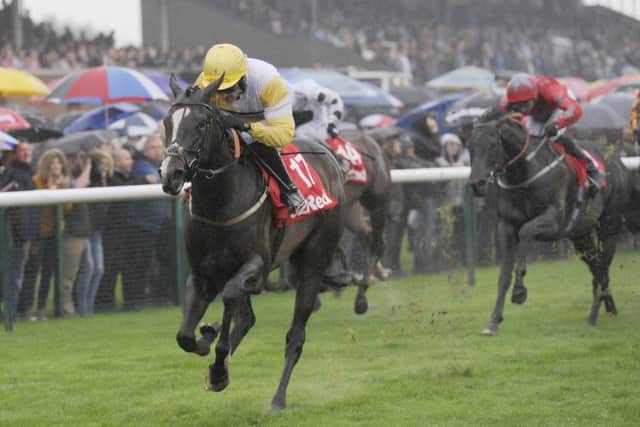Quiet Reflection ridden by Dougie Costello (left) wins the 32 Red Sprint Cup Stakes at Haydock.