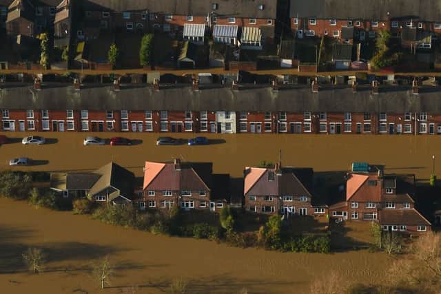 Huntingdon Road and Yearsley Crescent covered by floodwater after the River Ouse and River Foss burst their banks in York city centre, last December