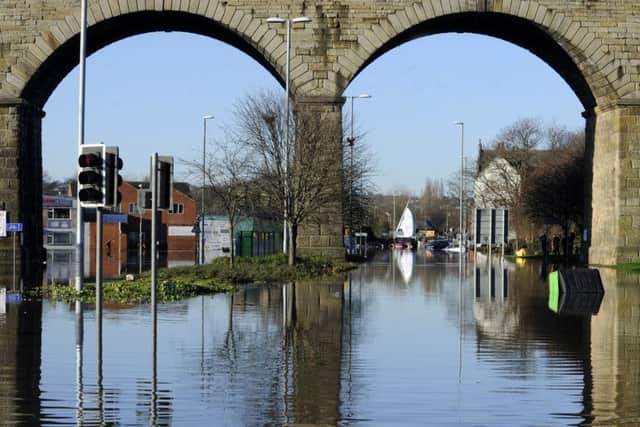 DECEMBER 2015: Flooding in Kirkstall Road. PIC: Bruce Rollinson
