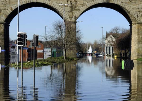 DECEMBER 2015: Flooding in Kirkstall Road. PIC: Bruce Rollinson