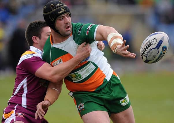 STAYING PUT: Hunslet's Michael Haley off-loads in the tackle