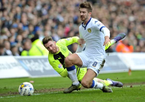 WE'LL MEET AGAIN: Action from last year's clash at Elland Road between Leeds United and Huddersfield Town.  Picture Tony Johnson