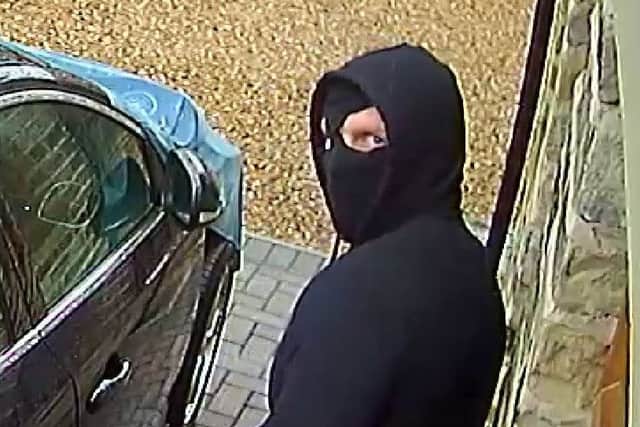 Two of the three men kept their faces covered throughout the robbery in Pudsey.