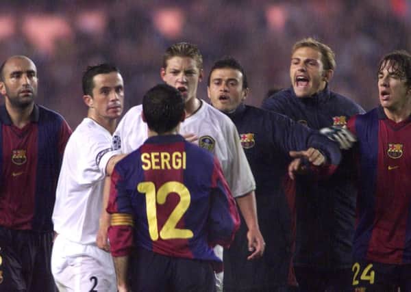 MEMORIES: Leeds United's Alan Smith confronts Barcelona's Sergi during their Champions League draw at Elland Road in  2000. PIC: PA