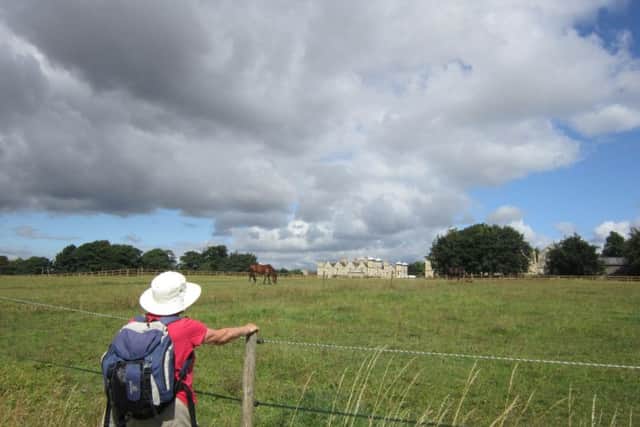 Dramatic clouds over Ledston Hall on the outward leg.