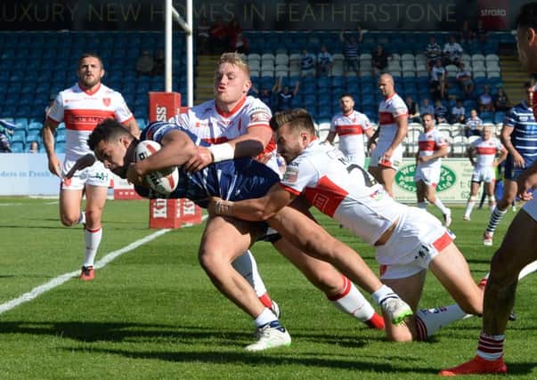 Featherstone Rovers' Josh Walters, scoring a try.