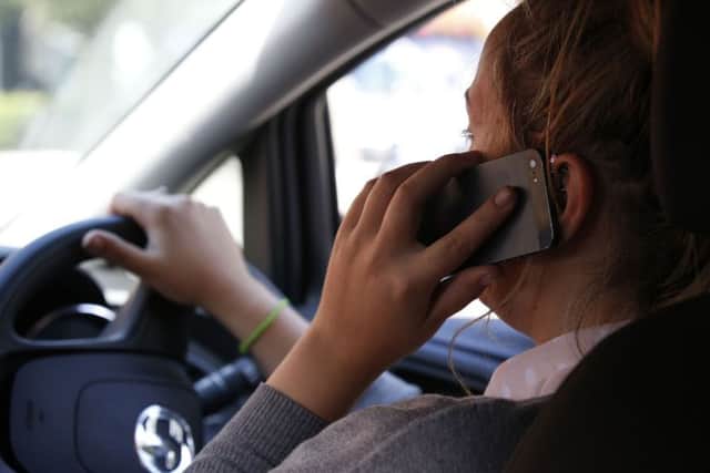 Motorists caught using their mobile phone while at the wheel face bigger fines, but do they go far enough?