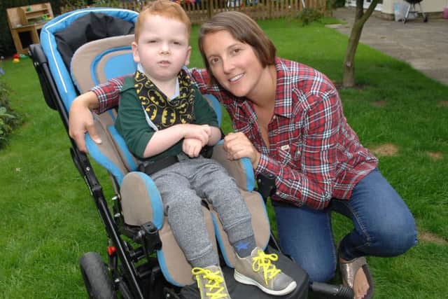 Five-year-old Felix with his mum, Sarah.