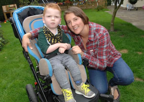 Five-year-old Felix with his mum, Sarah.