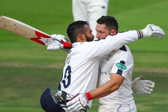 Tim Bresnan is embraced by Azeem Rafiq after reaching his century for Yorkshire against Middlesex (Picture: Alex Whitehead/SWpix.com).