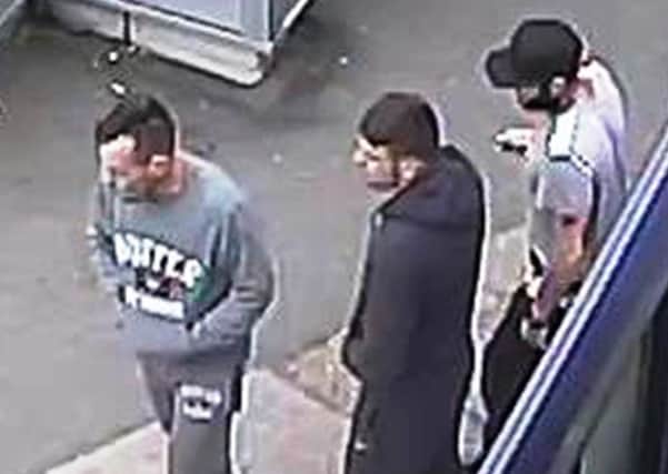 Police want to speak to these men about a theft from a car parked at New Pudsey Railway Station.