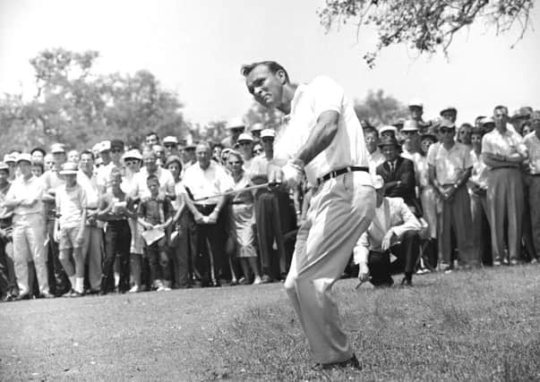 Arnold Palmer, pictured in 1962, enchanted TV audiences with his swashbuckling play and effortless charisma. (AP Photo/Ted Powers)