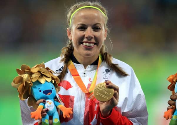 File photo dated 14-09-2016 of Great Britain's Hannah Cockroft poses with her gold medal from the Women's 400 metres T34 Final. PRESS ASSOCIATION Photo. Issue date: Sunday September 18, 2016. Wheelchair racer Hannah Cockroft won her second title of Rio 2016 and fourth in all with victory in the T34 400m, a new event on the programme. The win came despite a mishap with her racing chair, when the bus driver tripped over it in transit and bent the front forks the wrong way. See PA story OLYMPICS British Highlights. Photo credit should read Adam Davy/PA Wire.